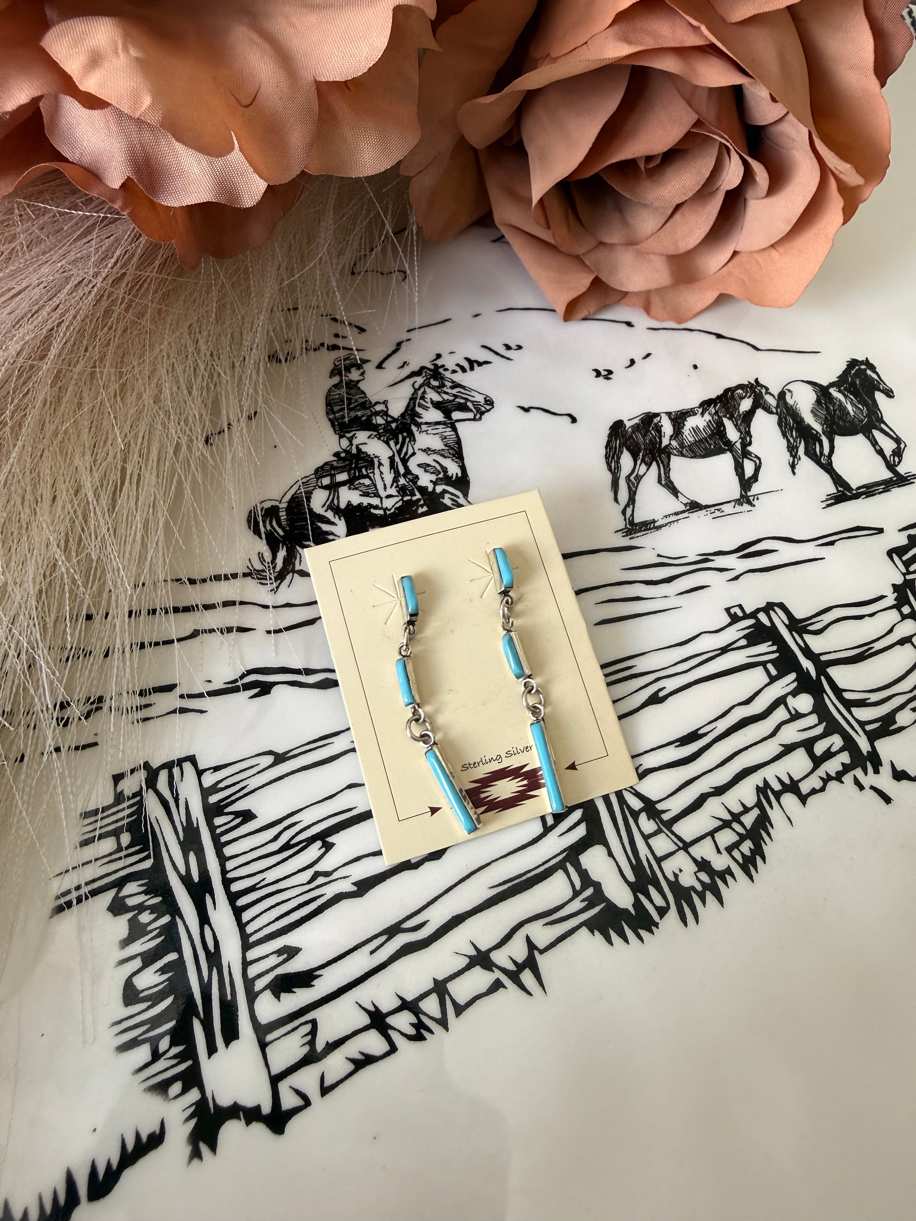 Falena Hooee Dangle Earrings